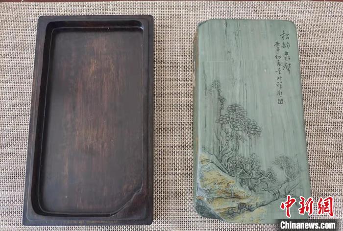 圖為盧保勝為提升洮硯文化內(nèi)涵，制作“一硯一銘、一盒一拓”成品展示?！堟?攝